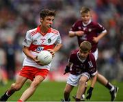 9 July 2022; Ruairí Smith, Killygarry N.S., Killygarry, Cavan, representing Derry and Jamie Burns, St Marys N.S., Kilrusheighter, Templeboy, Sligo, representing Galway during the INTO Cumann na mBunscol GAA Respect Exhibition Go Games at half-time of the GAA Football All-Ireland Senior Championship Semi-Final match between Galway and Derry at Croke Park in Dublin. Photo by Ray McManus/Sportsfile