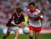 9 July 2022; Aaron Mullally, Murrintown N.S., Murrintown, Wexford, representing Galway and Ruairí Smith, Killygarry N.S., Killygarry, Cavan, representing Derry during the INTO Cumann na mBunscol GAA Respect Exhibition Go Games at half-time of the GAA Football All-Ireland Senior Championship Semi-Final match between Galway and Derry at Croke Park in Dublin. Photo by Stephen McCarthy/Sportsfile  Photo by Ray McManus/Sportsfile *** NO REPRODUCTION FEE ***