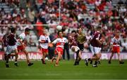 9 July 2022; Eoin Kearney, St Joseph's B.N.S., Abbeytown, Boyle, Roscommon, representing Galway and Ken Irwin, Saint Lorcan's Boy's N.S., Palmerstown, Dublin, representing Derry during the INTO Cumann na mBunscol GAA Respect Exhibition Go Games at half-time of the GAA Football All-Ireland Senior Championship Semi-Final match between Galway and Derry at Croke Park in Dublin. Photo by Ray McManus/Sportsfile