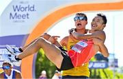 15 July 2022; Gold medallist Toshikazu Yamanishi of Japan is lifted by bronze medallist Perseus Karlstrom of Sweden after the men's 20km final during day one of the World Athletics Championships at Hayward Field in Eugene, Oregon, USA. Photo by Sam Barnes/Sportsfile