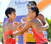 15 July 2022; Silver medallist Koki Ikeda, left, bronze medallist Perseus Karlstrom of Sweden and gold medallist Toshikazu Yamanishi of Japan celebrate after the men's 20km final during day one of the World Athletics Championships at Hayward Field in Eugene, Oregon, USA. Photo by Sam Barnes/Sportsfile