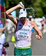 15 July 2022; Rhydian Cowley of Australia takes on water in the men's 20km final during day one of the World Athletics Championships at Hayward Field in Eugene, Oregon, USA. Photo by Sam Barnes/Sportsfile