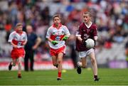 9 July 2022; Francis Óg McTiernan, St. Caillin's N.S., Fenagh, Leitrim, representing Galway and Pádraig Donaghy, Blessed Patrick O'Loughran P.S., Castlecaulfield, Dungannon, Tyrone, representing Derry during the INTO Cumann na mBunscol GAA Respect Exhibition Go Games at half-time of the GAA Football All-Ireland Senior Championship Semi-Final match between Galway and Derry at Croke Park in Dublin. Photo by Ray McManus/Sportsfile