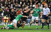 16 July 2022; Sam Cane of New Zealand is tackled by Jonathan Sexton and Jamison Gibson-Park of Ireland during the Steinlager Series match between the New Zealand and Ireland at Sky Stadium in Wellington, New Zealand. Photo by Brendan Moran/Sportsfile