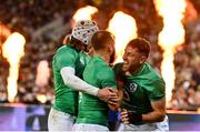 16 July 2022; Hugo Keenan of Ireland, right, celebrates with teammates Jamison Gibson Park and Mack Hansen after scoring his side's second try during the Steinlager Series match between the New Zealand and Ireland at Sky Stadium in Wellington, New Zealand. Photo by Brendan Moran/Sportsfile