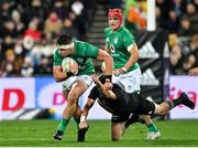 16 July 2022; Dan Sheehan of Ireland evades the tackle of Beauden Barrett of New Zealand during the Steinlager Series match between the New Zealand and Ireland at Sky Stadium in Wellington, New Zealand. Photo by Brendan Moran/Sportsfile
