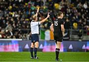 16 July 2022; Referee Wayne Barnes shows a yellow card to Andrew Porter of Ireland, not pictured, during the Steinlager Series match between the New Zealand and Ireland at Sky Stadium in Wellington, New Zealand. Photo by Brendan Moran/Sportsfile