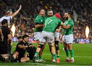 16 July 2022; Rob Herring of Ireland, centre, celebrates with teammates, from left, James Lowe, Josh van der Flier and Jamison Gibson Park of Ireland after scoring his side's fourth try during the Steinlager Series match between the New Zealand and Ireland at Sky Stadium in Wellington, New Zealand. Photo by Brendan Moran/Sportsfile