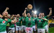 16 July 2022; Andrew Porter of Ireland lifts the trophy with teammates after his side's victory in the Steinlager Series match between the New Zealand and Ireland at Sky Stadium in Wellington, New Zealand. Photo by Brendan Moran/Sportsfile