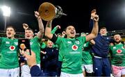16 July 2022; James Lowe of Ireland lifts the trophy with teammates after his side's victory in the Steinlager Series match between the New Zealand and Ireland at Sky Stadium in Wellington, New Zealand. Photo by Brendan Moran/Sportsfile