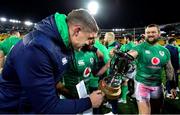 16 July 2022; Garry Ringrose, left, Jamison Gibson Park and Andrew Porter of Ireland celebrate with the cup after the Steinlager Series match between the New Zealand and Ireland at Sky Stadium in Wellington, New Zealand. Photo by Brendan Moran/Sportsfile