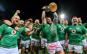 16 July 2022; Ireland players, from left, Finlay Bealham, Rob Herring, Josh van der Flier, Robbie Henshaw, Andrew Porter, Conor Murray, Hugo Keenan, Tadhg Furlong and Jack Conan celebrate with the cup after the Steinlager Series match between the New Zealand and Ireland at Sky Stadium in Wellington, New Zealand. Photo by Brendan Moran/Sportsfile