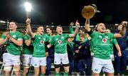 16 July 2022; Ireland players, from left, James Ryan, Jonathan Sexton, Joey Carbery,  Peter O’Mahony and James Lowe celebrate with the cup after the Steinlager Series match between the New Zealand and Ireland at Sky Stadium in Wellington, New Zealand. Photo by Brendan Moran/Sportsfile