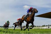 16 July 2022; Hans Andersen, with Ryan Moore up, on their way to winning the Juddmonte Farms Expert Eye Irish EBF Maiden during day one of the Juddmonte Irish Oaks Weekend at The Curragh Racecourse in Kildare. Photo by Seb Daly/Sportsfile