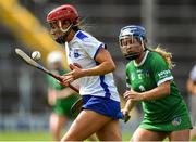 16 July 2022; Mairead Power of Waterford in action against Caoimhe Costello of Limerick during the Glen Dimplex All-Ireland Senior Camogie Quarter Final match between  Waterford and Limerick at Semple Stadium in Thurles, Tipperary. Photo by George Tewkesbury/Sportsfile