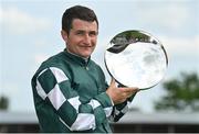 16 July 2022; Jockey Shane Foley with the trophy after winning the Juddmonte Irish Oaks on Magical Lagoon during day one of the Juddmonte Irish Oaks Weekend at The Curragh Racecourse in Kildare. Photo by Seb Daly/Sportsfile