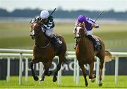 16 July 2022; Magical Lagoon, left, with Shane Foley up, on their way to winning the Juddmonte Irish Oaks, from second place Toy, with Ryan Moore up, during day one of the Juddmonte Irish Oaks Weekend at The Curragh Racecourse in Kildare. Photo by Seb Daly/Sportsfile