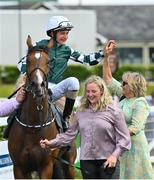 16 July 2022; Jockey Shane Foley celebrates with trainer Jessica Harrington after winning the Juddmonte Irish Oaks on Magical Lagoon during day one of the Juddmonte Irish Oaks Weekend at The Curragh Racecourse in Kildare. Photo by Seb Daly/Sportsfile