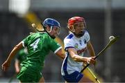 16 July 2022; Beth Carton of Waterford in action against Marian Quaid of Limerick during the Glen Dimplex All-Ireland Senior Camogie Quarter Final match between Waterford and Limerick at Semple Stadium in Thurles, Tipperary. Photo by George Tewkesbury/Sportsfile