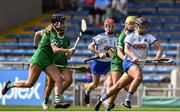 16 July 2022; Abby Flynn of Waterford in action against Rebecca Delee, left, and Stephanie Woulfe of Limerick during the Glen Dimplex All-Ireland Senior Camogie Quarter Final match between Waterford and Limerick at Semple Stadium in Thurles, Tipperary. Photo by George Tewkesbury/Sportsfile
