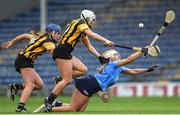 16 July 2022; Ali Twomey of Dublin is fouled by Mary O'Connell, left and Michaela Kenneally of Kilkenny during the Glen Dimplex All-Ireland Senior Camogie Quarter Final match between  Kilkenny and Dublin at Semple Stadium in Thurles, Tipperary. Photo by George Tewkesbury/Sportsfile