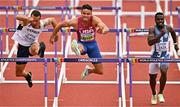 16 July 2022; Devon Allen of USA, centre, on his way to winning his men's 110m hurdles heat, ahead of Milan Trajkovic of Cyprus, left, who finished second, during day two of the World Athletics Championships at Hayward Field in Eugene, Oregon, USA. Photo by Sam Barnes/Sportsfile