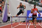 16 July 2022; Thomas Barr of Ireland, left, on his way to finishing second in his men's 400m hurdles heat during day two of the World Athletics Championships at Hayward Field in Eugene, Oregon, USA. Photo by Sam Barnes/Sportsfile