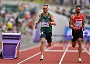 16 July 2022; Thomas Barr of Ireland, left, on his way to finishing second in his men's 400m hurdles heat during day two of the World Athletics Championships at Hayward Field in Eugene, Oregon, USA. Photo by Sam Barnes/Sportsfile