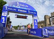 17 July 2022; John Black crosses the line to finish third in the Irish Life Dublin Race Series Fingal 10K in Swords, Dublin. Photo by Harry Murphy/Sportsfile