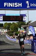17 July 2022; Graham Gilshinan reacts as he crosses the line to finish the Irish Life Dublin Race Series Fingal 10K in Swords, Dublin. Photo by Harry Murphy/Sportsfile