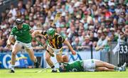 17 July 2022; Martin Keoghan of Kilkenny in action against Diarmaid Byrnes, left, and Mike Casey of Limerick during the GAA Hurling All-Ireland Senior Championship Final match between Kilkenny and Limerick at Croke Park in Dublin. Photo by Ramsey Cardy/Sportsfile