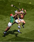 17 July 2022; TJ Reid, left, and TJ Reid of Kilkenny in action against Barry Nash of Limerick during the GAA Hurling All-Ireland Senior Championship Final match between Kilkenny and Limerick at Croke Park in Dublin. Photo by Daire Brennan/Sportsfile