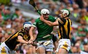 17 July 2022; Aaron Gillane of Limerick is tackled by Paddy Deegan, left, and Huw Lawlor of Kilkenny during the GAA Hurling All-Ireland Senior Championship Final match between Kilkenny and Limerick at Croke Park in Dublin. Photo by Harry Murphy/Sportsfile