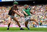 17 July 2022; Martin Keoghan of Kilkenny scores his side's second goal despite the tackle of Seán Finn of Limerick during the GAA Hurling All-Ireland Senior Championship Final match between Kilkenny and Limerick at Croke Park in Dublin. Photo by Harry Murphy/Sportsfile