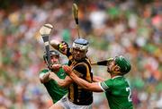 17 July 2022; TJ Reid of Kilkenny in action against Seán Finn, right, and Declan Hannon of Limerick during the GAA Hurling All-Ireland Senior Championship Final match between Kilkenny and Limerick at Croke Park in Dublin. Photo by Eóin Noonan/Sportsfile