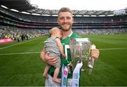 17 July 2022; Séamus Flanagan of Limerick and his 12-week-old son Freddie celebrates with the Liam MacCarthy Cup after the GAA Hurling All-Ireland Senior Championship Final match between Kilkenny and Limerick at Croke Park in Dublin. Photo by Stephen McCarthy/Sportsfile