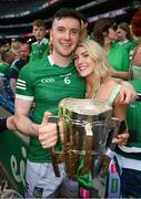 17 July 2022; Declan Hannon of Limerick and his partner Louise Cantillon celebrate with the Liam MacCarthy Cup  after the GAA Hurling All-Ireland Senior Championship Final match between Kilkenny and Limerick at Croke Park in Dublin. Photo by Stephen McCarthy/Sportsfile