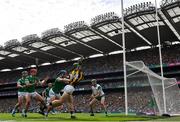 17 July 2022; Martin Keoghan of Kilkenny attempts to keep the sliotar in play under pressure from Mike Casey of Limerick during the GAA Hurling All-Ireland Senior Championship Final match between Kilkenny and Limerick at Croke Park in Dublin. Photo by Ramsey Cardy/Sportsfile