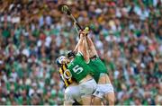 17 July 2022; Dan Morrissey, right, and Diarmaid Byrnes of Limerick in action against TJ Reid of Kilkenny during the GAA Hurling All-Ireland Senior Championship Final match between Kilkenny and Limerick at Croke Park in Dublin. Photo by Stephen McCarthy/Sportsfile
