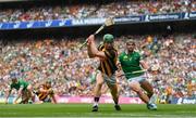17 July 2022; Martin Keoghan of Kilkenny shoots to score his side's second goal despite the attention of Seán Finn of Limerick during the GAA Hurling All-Ireland Senior Championship Final match between Kilkenny and Limerick at Croke Park in Dublin. Photo by Harry Murphy/Sportsfile