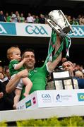 17 July 2022; Graeme Mulcahy of Limerick and one year old Róise lift the Liam MacCarthy Cup the GAA Hurling All-Ireland Senior Championship Final match between Kilkenny and Limerick at Croke Park in Dublin. Photo by Ray McManus/Sportsfile