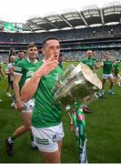 17 July 2022; Darragh O'Donovan of Limerick celebrates with the Liam MacCarthy Cup after the GAA Hurling All-Ireland Senior Championship Final match between Kilkenny and Limerick at Croke Park in Dublin. Photo by Stephen McCarthy/Sportsfile