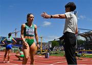 17 July 2022; Sophie Becker of Ireland, left, is stopped by an offical by mistake whilst making her way to the starting blocks before her women's 400m heats during day three of the World Athletics Championships at Hayward Field in Eugene, Oregon, USA. Photo by Sam Barnes/Sportsfile