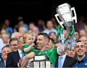 17 July 2022; Graeme Mulcahy of Limerick and one year old Róise lifts the Liam MacCarthy Cup after the GAA Hurling All-Ireland Senior Championship Final match between Kilkenny and Limerick at Croke Park in Dublin. Photo by Stephen McCarthy/Sportsfile
