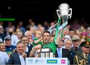17 July 2022; Graeme Mulcahy of Limerick and one year old Róise lifts the Liam MacCarthy Cup after the GAA Hurling All-Ireland Senior Championship Final match between Kilkenny and Limerick at Croke Park in Dublin. Photo by Stephen McCarthy/Sportsfile