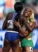 17 July 2022;  Shelly-Ann Fraser-Pryce of Jamaica, right, and Daryll Neita of Great Britain embrace after competing in the women's 100m semi-finals during day three of the World Athletics Championships at Hayward Field in Eugene, Oregon, USA. Photo by Sam Barnes/Sportsfile