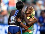 17 July 2022;  Shelly-Ann Fraser-Pryce of Jamaica, right, and Daryll Neita of Great Britain embrace after competing in the women's 100m semi-finals during day three of the World Athletics Championships at Hayward Field in Eugene, Oregon, USA. Photo by Sam Barnes/Sportsfile