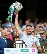 17 July 2022; Limerick strength & conditioning coach Cairbre Ó Cairealláin lifts the Liam MacCarthy Cup after the GAA Hurling All-Ireland Senior Championship Final match between Kilkenny and Limerick at Croke Park in Dublin. Photo by Stephen McCarthy/Sportsfile