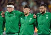 16 July 2022; Ireland players, from left, Dan Sheehan, Hugo Keenan and Robbie Henshaw during the national anthems before the Steinlager Series match between the New Zealand and Ireland at Sky Stadium in Wellington, New Zealand. Photo by Brendan Moran/Sportsfile