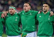 16 July 2022; Ireland players, from left, Rob Herring, Jack Conan and Conor Murray during the national anthems before the Steinlager Series match between the New Zealand and Ireland at Sky Stadium in Wellington, New Zealand. Photo by Brendan Moran/Sportsfile